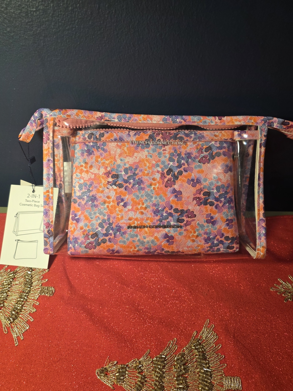 Brand new with tags (NWT). Never used. Stylish French Connection cosmetic bag.